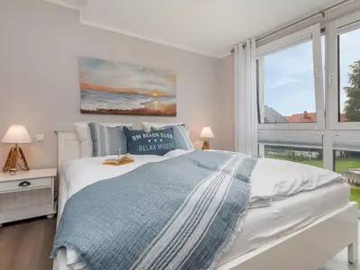 Ein Bett oder Betten in einem Zimmer der Unterkunft Ostseesegler