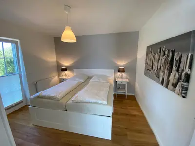Ein Bett oder Betten in einem Zimmer der Unterkunft Hus Hygge