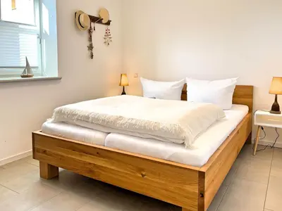 Ein Bett oder Betten in einem Zimmer der Unterkunft Cozy Two