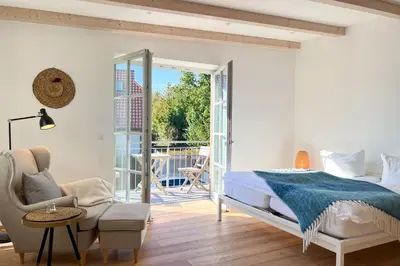 Ein Bett oder Betten in einem Zimmer der Unterkunft Cozy Three