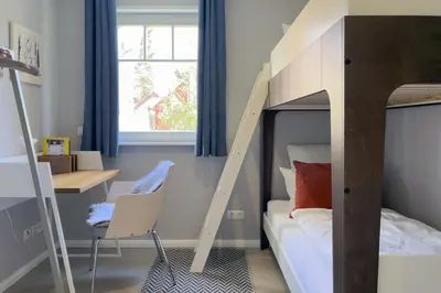 Ein Bett oder Betten in einem Zimmer der Unterkunft Fräulein Sidi