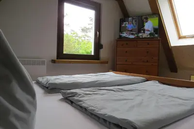 Ein Bett oder Betten in einem Zimmer der Unterkunft Ferienhaus Möve
