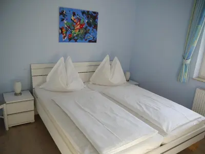 Ein Bett oder Betten in einem Zimmer der Unterkunft Wolkenlos