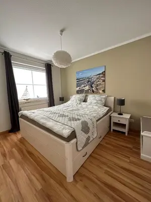 Ein Bett oder Betten in einem Zimmer der Unterkunft Meerzeit - a45022