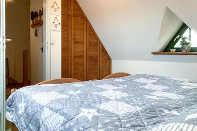 Ein Bett oder Betten in einem Zimmer der Unterkunft Windflüchter 1