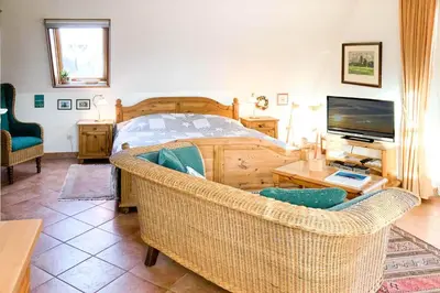 Ein Bett oder Betten in einem Zimmer der Unterkunft Windflüchter 3