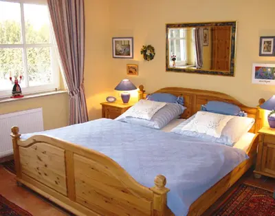 Ein Bett oder Betten in einem Zimmer der Unterkunft Windflüchter 4
