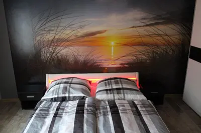 Ein Bett oder Betten in einem Zimmer der Unterkunft Ferienhaus „Strandhafer“