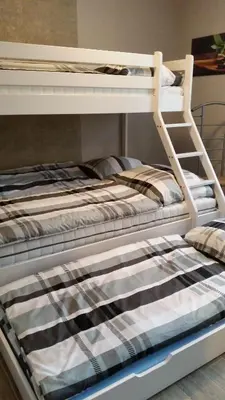 Ein Bett oder Betten in einem Zimmer der Unterkunft Ferienhaus „Strandhafer“
