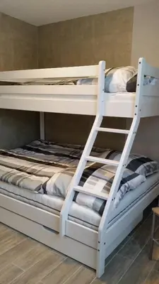 Ein Bett oder Betten in einem Zimmer der Unterkunft Ferienhaus „Strandhafer“