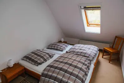 Ein Bett oder Betten in einem Zimmer der Unterkunft Ferienwohnung Strandperle