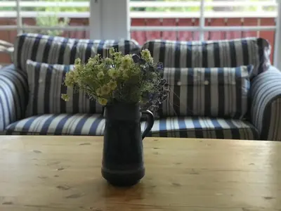 Ein Sitzbereich in der Unterkunft Ferienwohnung Strandperle