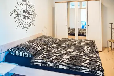 Ein Bett oder Betten in einem Zimmer der Unterkunft Windrose