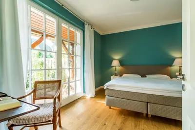 Ein Bett oder Betten in einem Zimmer der Unterkunft Atelierhaus 