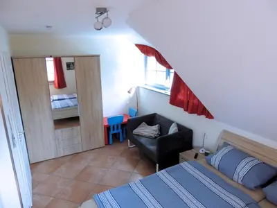 Ein Bett oder Betten in einem Zimmer der Unterkunft Neue Reihe 11a Haus Ankalath