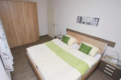 Ein Bett oder Betten in einem Zimmer der Unterkunft Neue Reihe 43 Villa Regulus EG
