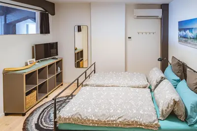 Ein Bett oder Betten in einem Zimmer der Unterkunft Boddenloft Wohnung 4.1