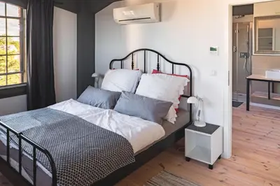 Ein Bett oder Betten in einem Zimmer der Unterkunft Boddenloft Wohnung 4.1