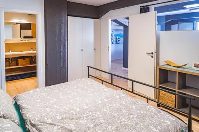 Ein Bett oder Betten in einem Zimmer der Unterkunft Boddenloft Wohnung 4.1