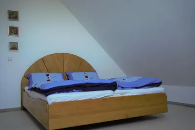 Ein Bett oder Betten in einem Zimmer der Unterkunft Strandburg