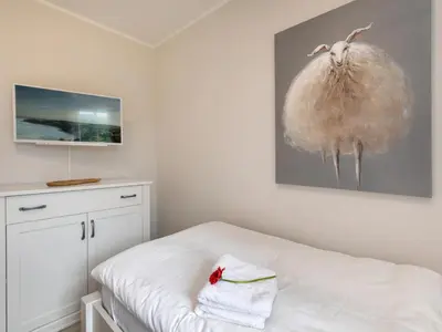 Ein Bett oder Betten in einem Zimmer der Unterkunft Haus Glebbe