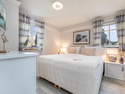 Ein Bett oder Betten in einem Zimmer der Unterkunft Haus Glebbe