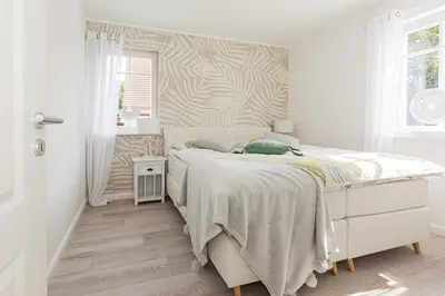 Ein Bett oder Betten in einem Zimmer der Unterkunft Haus Glebbe
