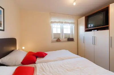 Ein Bett oder Betten in einem Zimmer der Unterkunft Magister Wigbold 12