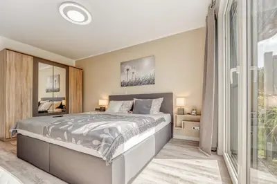 Ein Bett oder Betten in einem Zimmer der Unterkunft Strandflieder - Whg 02