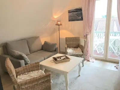 Ein Sitzbereich in der Unterkunft Ferienwohnungen im Haus Borée