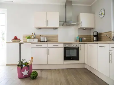 Küche/Küchenzeile in der Unterkunft Luxushaus Bodstedt mit Sauna am Bodden