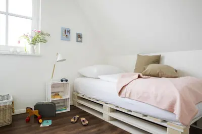 Ein Bett oder Betten in einem Zimmer der Unterkunft Luxushaus in Bodstedt mit Sauna und Lagune