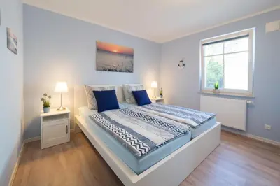 Ein Bett oder Betten in einem Zimmer der Unterkunft Möwennest 02
