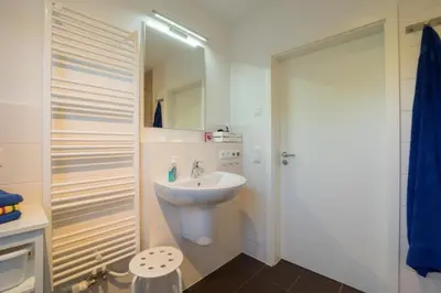 Ein Badezimmer in der Unterkunft Möwennest 02