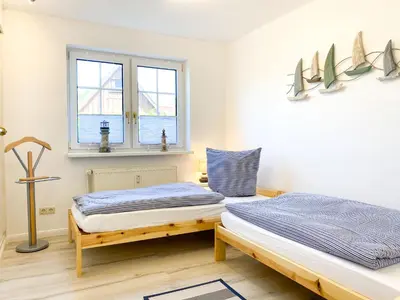 Ein Bett oder Betten in einem Zimmer der Unterkunft Hafenkoje Unterdeck