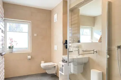 Ein Badezimmer in der Unterkunft Tordalk 01