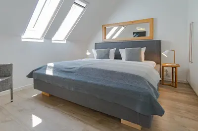 Ein Bett oder Betten in einem Zimmer der Unterkunft Tordalk 06