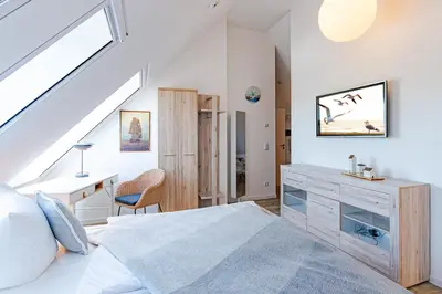 Ein Bett oder Betten in einem Zimmer der Unterkunft Tordalk 06
