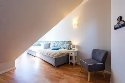 Ein Bett oder Betten in einem Zimmer der Unterkunft Gartenweg 7 Wohnung 2 3 oben links