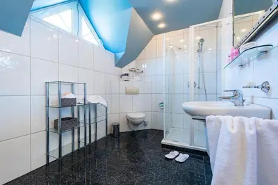 Ein Badezimmer in der Unterkunft Gartenweg 7 Wohnung 2 3 oben links
