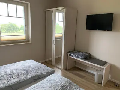 Ein Bett oder Betten in einem Zimmer der Unterkunft Zur Vogelwiese
