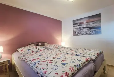 Ein Bett oder Betten in einem Zimmer der Unterkunft Ferienwohnung auf dem 