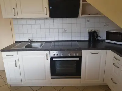 Küche/Küchenzeile in der Unterkunft Ferienwohnung Strandglück