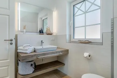 Ein Badezimmer in der Unterkunft Haus Küstenkind