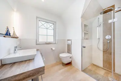 Ein Badezimmer in der Unterkunft Haus Küstenkind