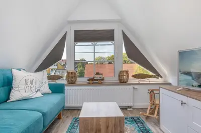 Ein Sitzbereich in der Unterkunft Haus Küstenkind