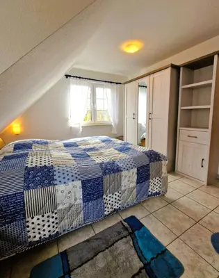 Ein Bett oder Betten in einem Zimmer der Unterkunft Seestr. 75 a Haus B (rechts )