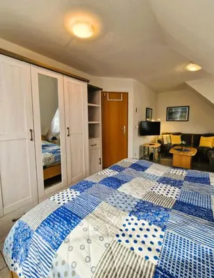 Ein Bett oder Betten in einem Zimmer der Unterkunft Seestr. 75 a Haus B (rechts )