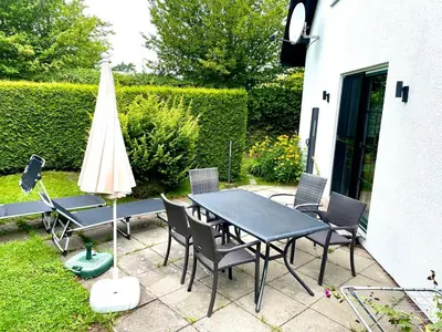 Ein Garten an der Unterkunft Seestr. 75 a Haus B (rechts )