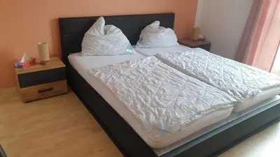 Ein Bett oder Betten in einem Zimmer der Unterkunft 